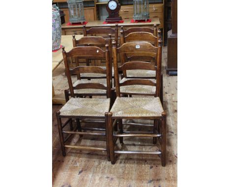 Set of six rush seated ladder back Country chairs.