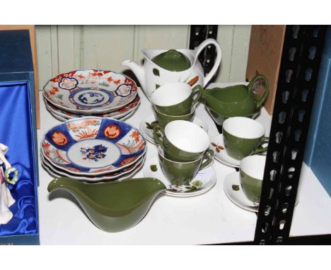 Six Imari plates and Midwinter tea service.