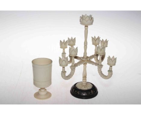 Vintage Indian ivory nine branch candelabrum, 25cm high, and stemmed beaker (2).