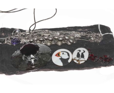 Three Swarovski pendants and two bracelets, large purple stone brooch, two Norwegian ceramic brooches and another bracelet (9