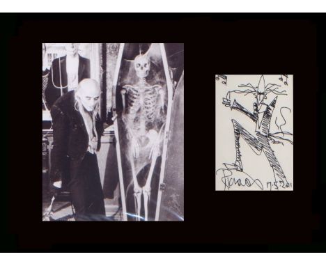 Richard O’Brien. Hand drawn sketch with picture from “Rocky Horror…” Professionally mounted in black to 16”x12”. Excellent. 