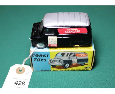 Corgi Toys Bedford 12CWT Van "EVENING STANDARD" (421). An example in black with silver roof, flat spun wheels and black rubbe