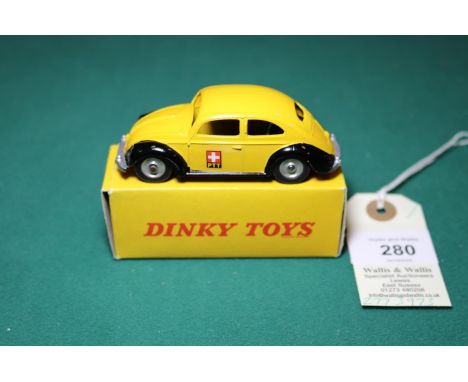 Dinky Toys Swiss Postal Volkswagen (262). In yellow and black 'PTT' livery, example with the later spun wheels and treaded bl