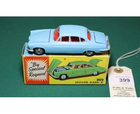 Corgi Toys Jaguar Mark X (238). An example in light blue with red interior. Boxed, 6/10, one end/side has tape and is dented,