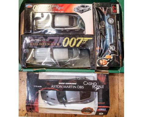 4 Large size James Bond cars, To Include A Nikko 1:16 scale Casino Royale Radio Control Aston Martin DBS, 1:18 scale UT Model