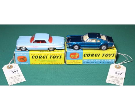 2 Corgi Toys. Oldsmobile Super 88 (235). In light blue with white flash tom sides, red interior, with dished spun wheels. Plu