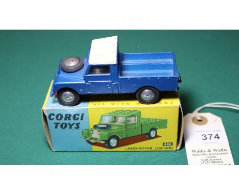 Corgi Toys Land Rover (109" WB) 406. A Series 1 Land Rover  in metallic blue with cream roof to cab, fitted with smooth spun 