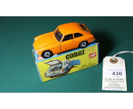 Corgi MGC GT Competition Model (345). In orange with black interior, spoked wheels and black tyres, no suitcase. Boxed 8/10 s
