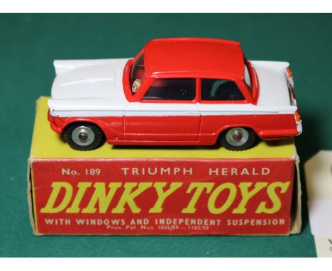 Dinky Toys Triumph Herald 'Point-of-Sale' example (189). A rare example in red and white with spun wheels and black treaded t