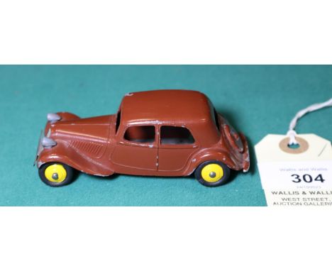 French Dinky Toy Citroen 11BL (24-N). A rare example (unlisted in Ramsay's Price Guide), finished in chocolate brown with yel