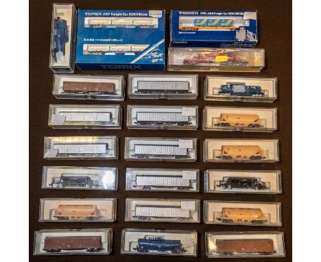 A quantity of 'N' gauge Freight Rolling Stock by KATO, Tomix and Trix. 3x Bogie Tank Wagons. 9x Bogie High-Capacity Vans (var