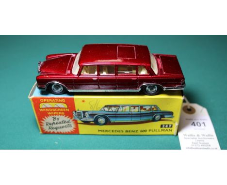 Corgi Toys Mercedes-Benz 600 Pullman (247). An example in the lighter metallic maroon with a cream interior, plated plastic w