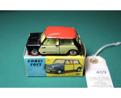 Corgi Toys Mini-Cooper With De-Luxe Wickerwork (249). In black with red roof and wickerwork yellow decals to sides and boot, 