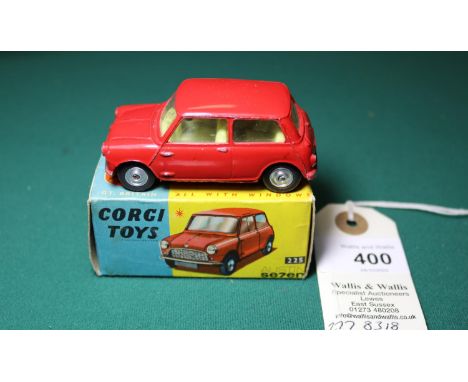 Corgi Toys Austin Seven (225). In red with yellow interior and dished spun wheels. Boxed, 7.5/10, light wear overall, complet