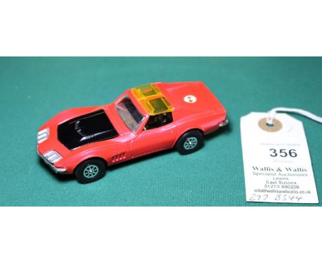 Corgi Whizzwheels Chevrolet Corvette Stingray Coupe (387). An example in metallic pink with black interior, satin black bonne