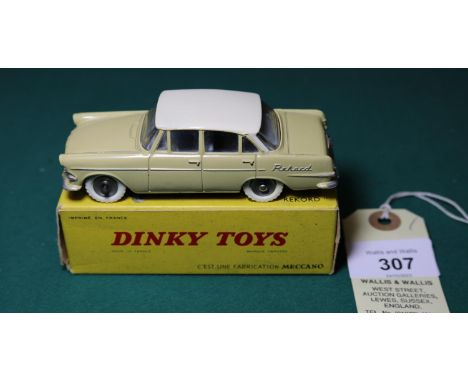 French Dinky Toys Opel "Rekord" (554). Beige body with cream roof, light grey interior, dished spun wheels with treaded white