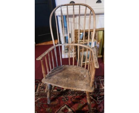 An 18th century elm stick back Windsor chair