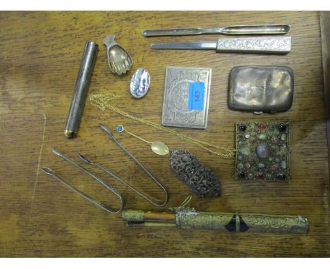 A selection of silver and other items to include a silver cigar holder, caddy spoon in the shape of a hand and Georgian sugar