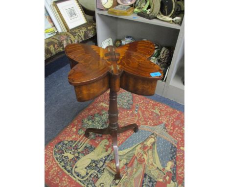 A reproduction marquetry butterfly occasional table on tripod base 