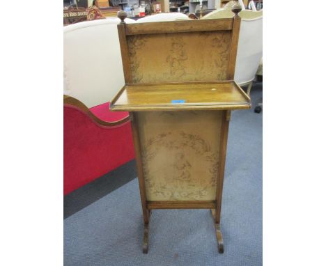 An early 20th century French mahogany framed tapestry screen with incorporated book shelf, 41"h 