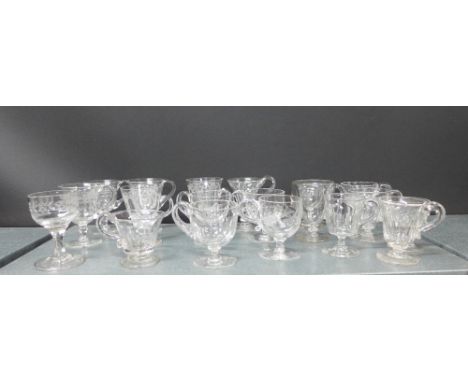 Collection of late 19th and early 20th century clear glass custard cups of various shapes and size, (20) 