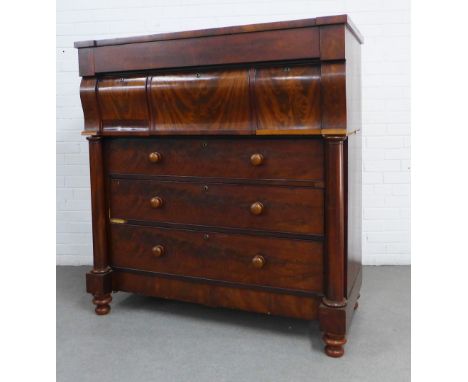 Victorian mahogany scotch chest in two parts, with an inverted breakfront top over a long drawer and three cushion fronted dr