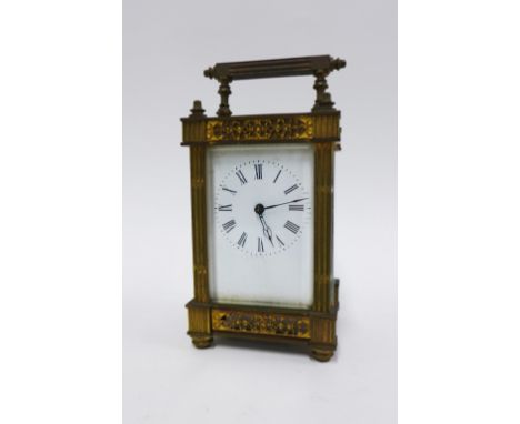 Edwardian brass carriage clock with decorative case and French movement, 15.5cm including handle 