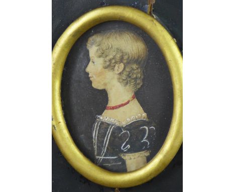 Georgian portrait miniature of a young girl in watercolour, in an oval mount and gilt frame, 5 x 7cm 