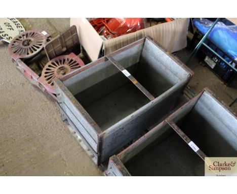 A rectangular galvanised and metal planter