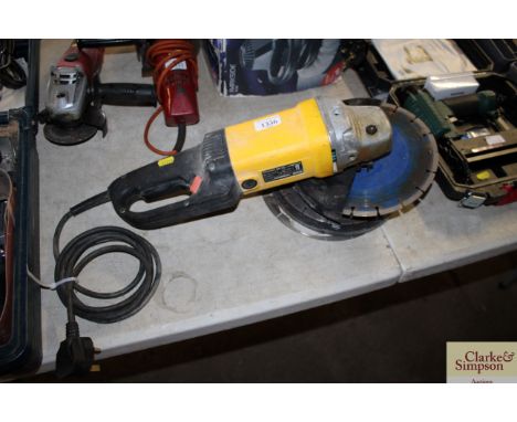 A large Einhell angle grinder with blades and disc's