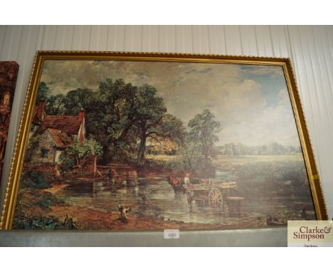 A gilt framed coloured print "The Haywain" after John Constable