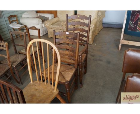 An oak ladder back dining chair and an oak ladder back carver chair