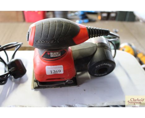 A Black &amp; Decker orbital sander