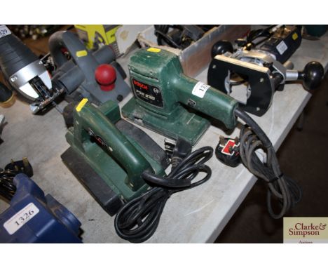 A Bosch planer and a Bosch orbital sander