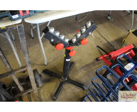 An adjustable roller stand