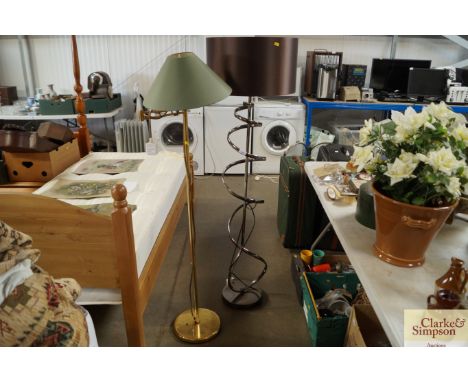 A modern design standard lamp together with an adjustable standard lamp