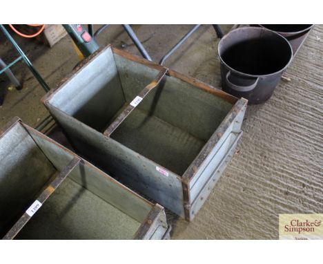 A rectangular galvanised and metal planter