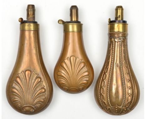 A copper powder flask,  embossed rope and chain panels, common brass top, 3 position charger marked Dixon &amp; Sons, 7½” ove