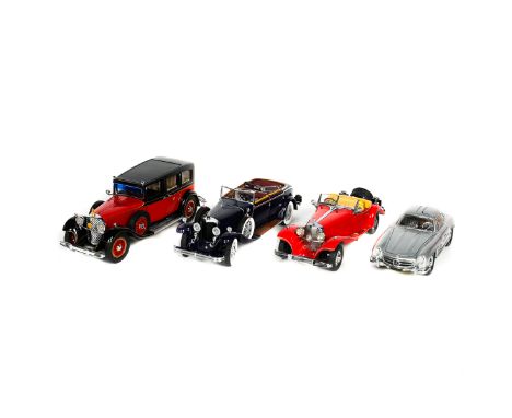 4 Franklin Mint Mercedes Benz. 1926 Model K in black with patterned upholstery. 1935 770K in red and black with black and bei