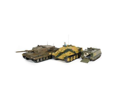 15 kit-built military vehicles in approximately 1:32 scale. Highly detailed plastic models built from kits by a talented mode