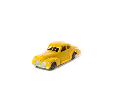 A scarce late 1930s Dinky Toys Studebaker (39f). A seldom seen example in bright yellow with a light gold lacquered baseplate