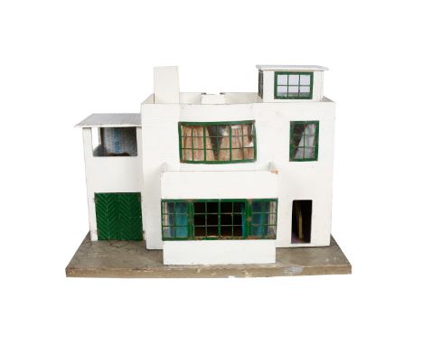 A Tri-ang Art Deco Doll's House (No.52 3138). From the Tri-ang 'Ultra-Modern' range of houses this example features 4 rooms, 