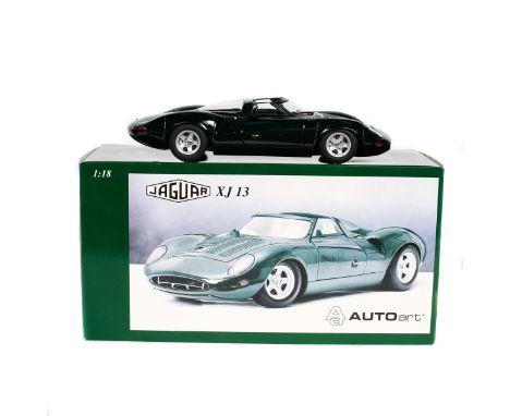 Autoart 1:18 scale Jaguar XJ13. In British Racing Green with grey wheels. Significant detail with V12 engine, full instrument