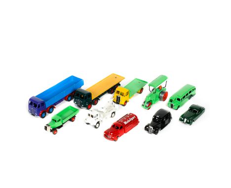 10 well restored Dinky Toys. Foden flatbed, Foden wagon, half cab bus, Austin Taxi, Studebaker tanker, Jaguar XK120, Guy flat