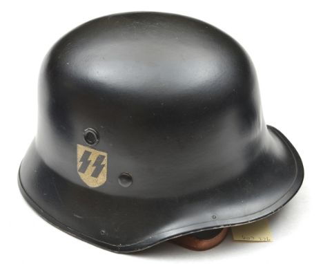 A post war German light weight police helmet, the lining with top pad bearing “Erel” trade mark of Robert Lubstein, Berlin, t