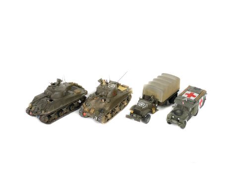 15 kit-built military vehicles in approximately 1:32 scale plus a field gun emplacement diorama. Highly detailed plastic mode