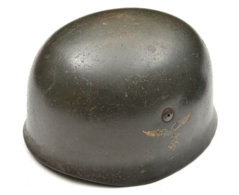 A WWII style German 2nd model single decal paratrooper helmet,  the skull with smooth grey finish and spurious Luftwaffe eagl