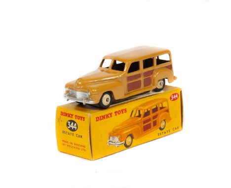 Dinky Toys Estate Car (344). A Plymouth in light brown with dark brown panels, cream wheels, base with large lettering and bl