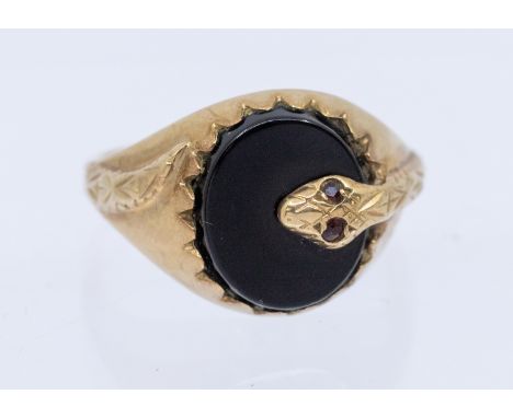 Men's 9ct Yellow Gold Onyx Signet ring with Serpent Design.  The Serpents eyes are inset with two melee Round Faceted Garnets