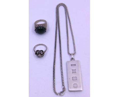 Selection of Sterling Silver Jewellery.  To include a Vintage Sterling Silver Ingot and chain and two Sterling Silver Rings. 